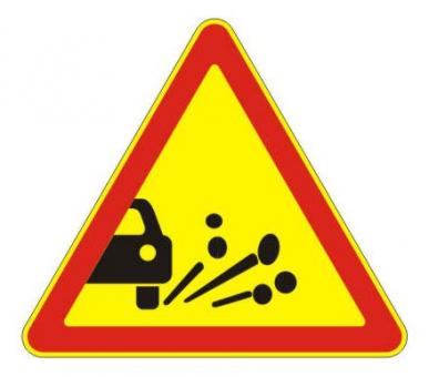 1.18 — Выброс гравия (щебня) - временный дорожный знак на желтом фоне
